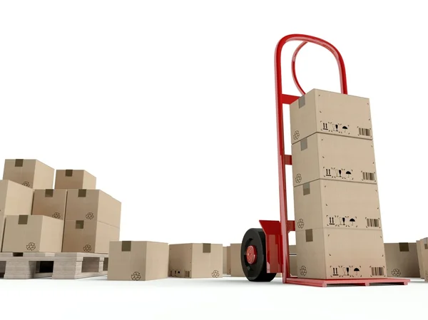 Magazijn hand vrachtwagen en vele kartonnen dozen — Stockfoto