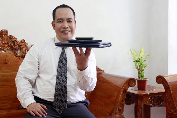 Businessman with gadget on his hand