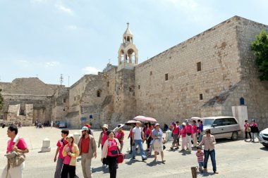 BETHLEHEM, PALESTIN - AUGUST 30: Excursion in The Church of the Nativity of Jesus Christ August 30, 2011 in Bethlehem, Palestin clipart