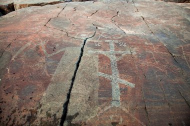 Mysterious petroglyphs of Onega. Besov Nos clipart