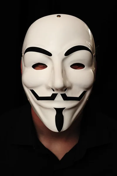 Anonymous mask of the the international hacker group Anonymous — Stock Photo, Image
