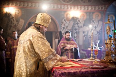 MOSCOW - MARCH 14: Orthodox liturgy with bishop Mercury in High clipart