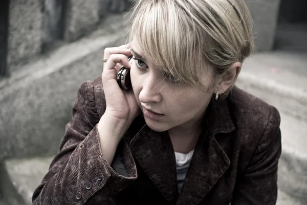 Blonde girl with mobile phone — Stock Photo, Image