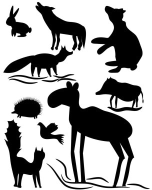 the isolated silhouettes of wood animals clipart