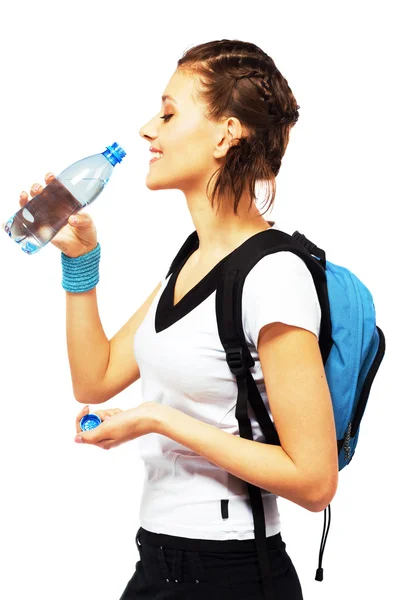 Happy sporty woman is drinking a fresh water — Stock Photo, Image