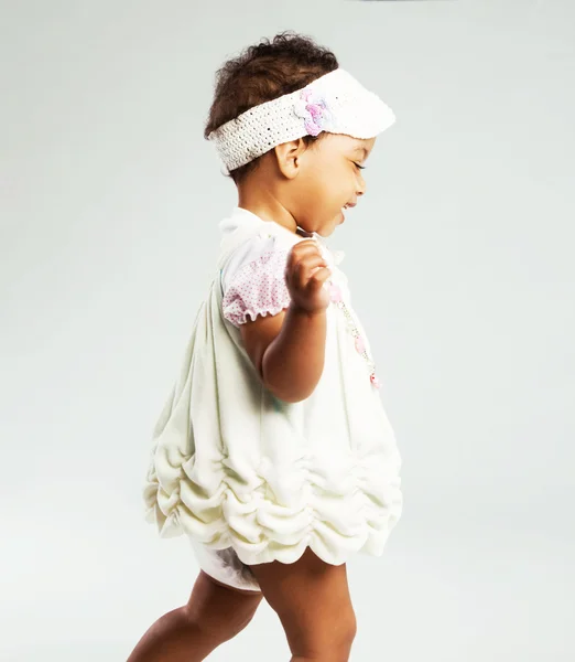 Lovely little girl is running — Stock Photo, Image