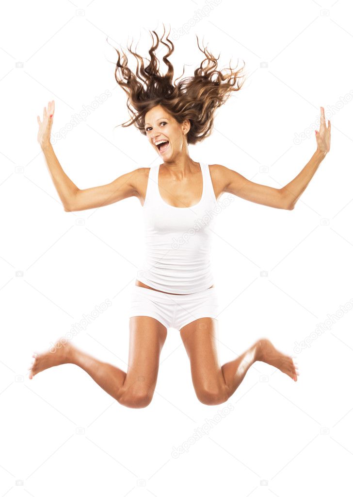 Cheerful woman is jumping