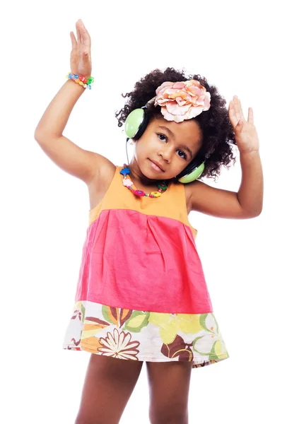 Aranyos kis lány táncol fejhallgató — Stock Fotó