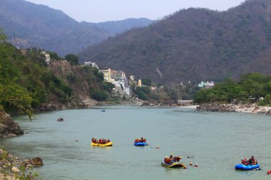 Rafting on the Ganges, the city of Rishikesh, North India clipart