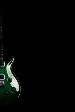 Electric guitar isolated on the black background clipart