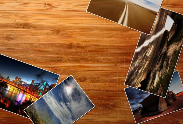 Фотографии на деревянном столе — стоковое фото
