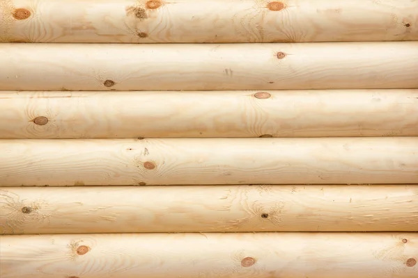 Patrón de fondo natural de una pared de troncos — Foto de Stock