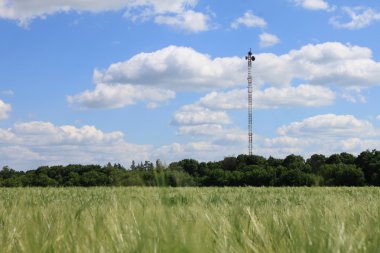 Mobile rig in a field clipart