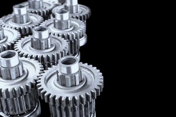 Close up gears on black — Stock Photo, Image