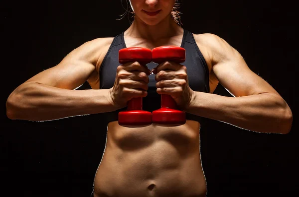 Mulher fitness com sinos — Fotografia de Stock