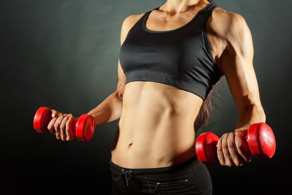 Fitness woman with barbells Royalty Free Stock Photos