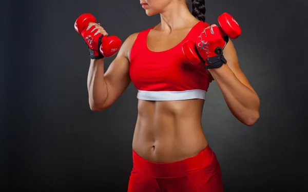 Fitness woman with barbells Stock Photo