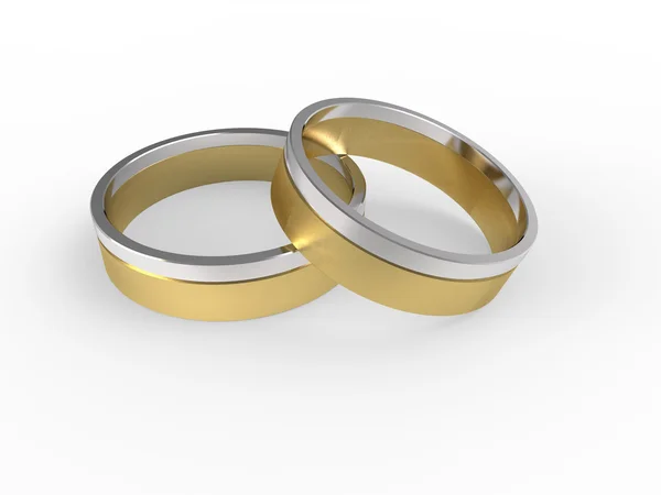 Izole beyaz zemin üzerine altın ve gümüş nikah yüzükleri — Stok fotoğraf