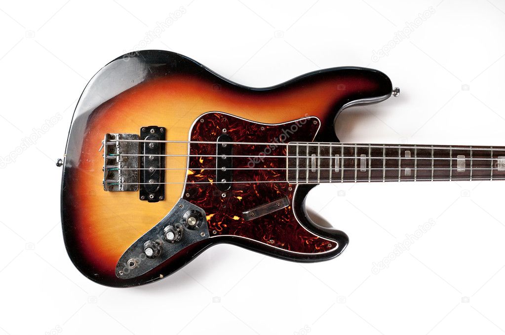 Vintage bass guitar on a white background