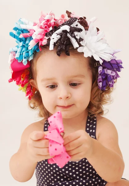 Girl with ribbons in her hair — Stock Photo, Image