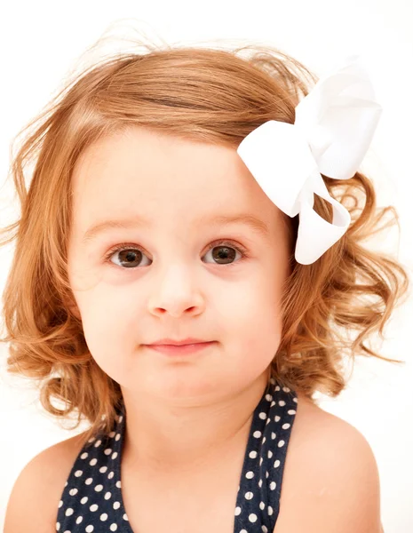 Girl with a bow — Stock Photo, Image