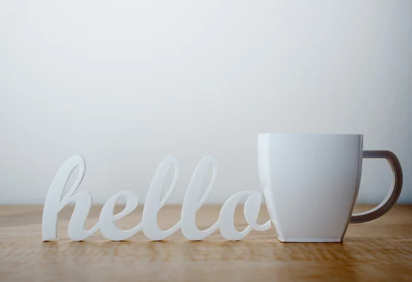 Hallo mit Kaffeebecher — Stockfoto
