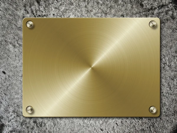 Goldene Platte auf Beton — Stockfoto
