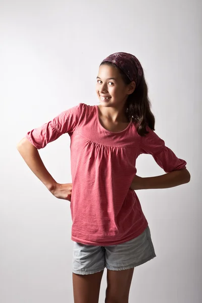 Young girl posing with hands on hip. — Stock Photo, Image