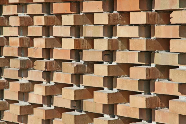 Stock image Illuminated red wall bricks arranged orthogonally