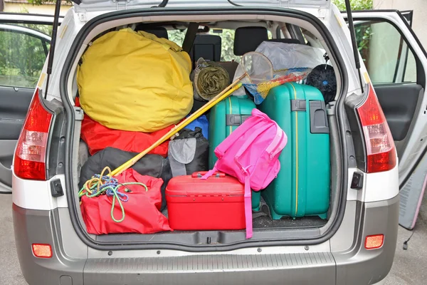 Luggage in the family car ready for the holidays — Stock Photo, Image