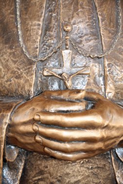 Hands of the priest who pray clipart