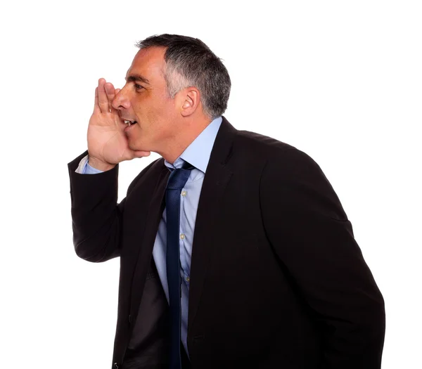 Hispanic senior businessman whispering — Stock Photo, Image