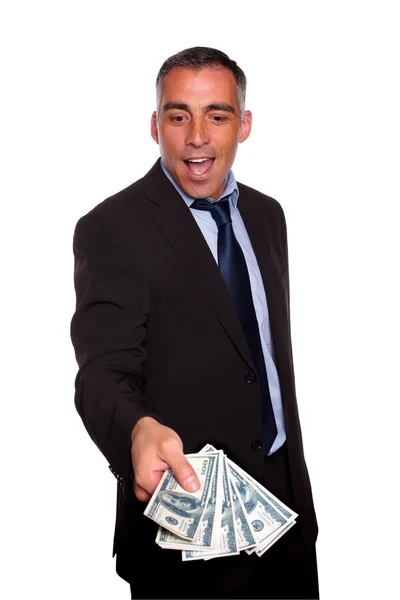 Executivo animado segurando e mostrando dinheiro em dinheiro — Fotografia de Stock