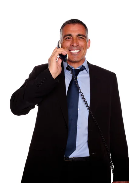 Carismático hombre de negocios riendo por teléfono —  Fotos de Stock