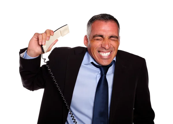 Executivo estressado ouvindo no telefone — Fotografia de Stock