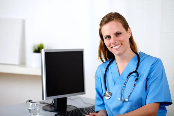 Beautiful caucasian nurse on workplace Royalty Free Stock Images