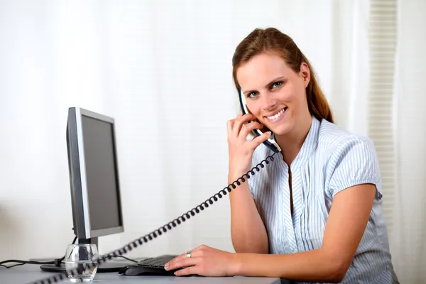 Young attractive executive woman on phone — Stock Photo, Image