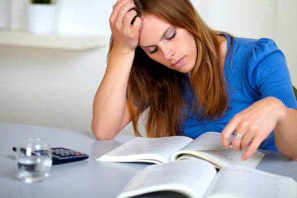 Adult pretty student girl reading a book — Stock Photo, Image