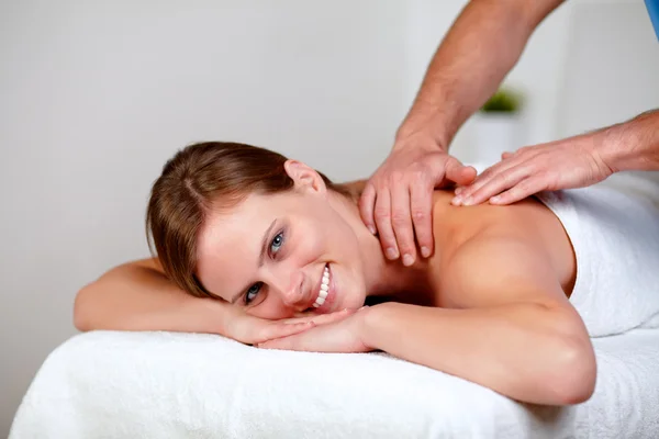 Charming young blonde woman relaxing at a spa — Stock Photo, Image