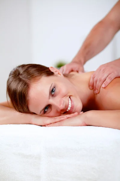 Young blonde girl relaxing at a spa — Stock Photo, Image