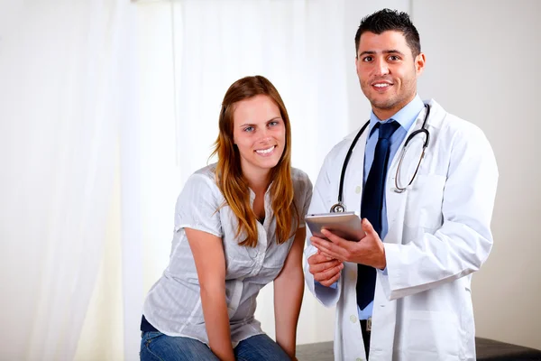 Young pretty woman with her medical doctor — Stock Photo, Image