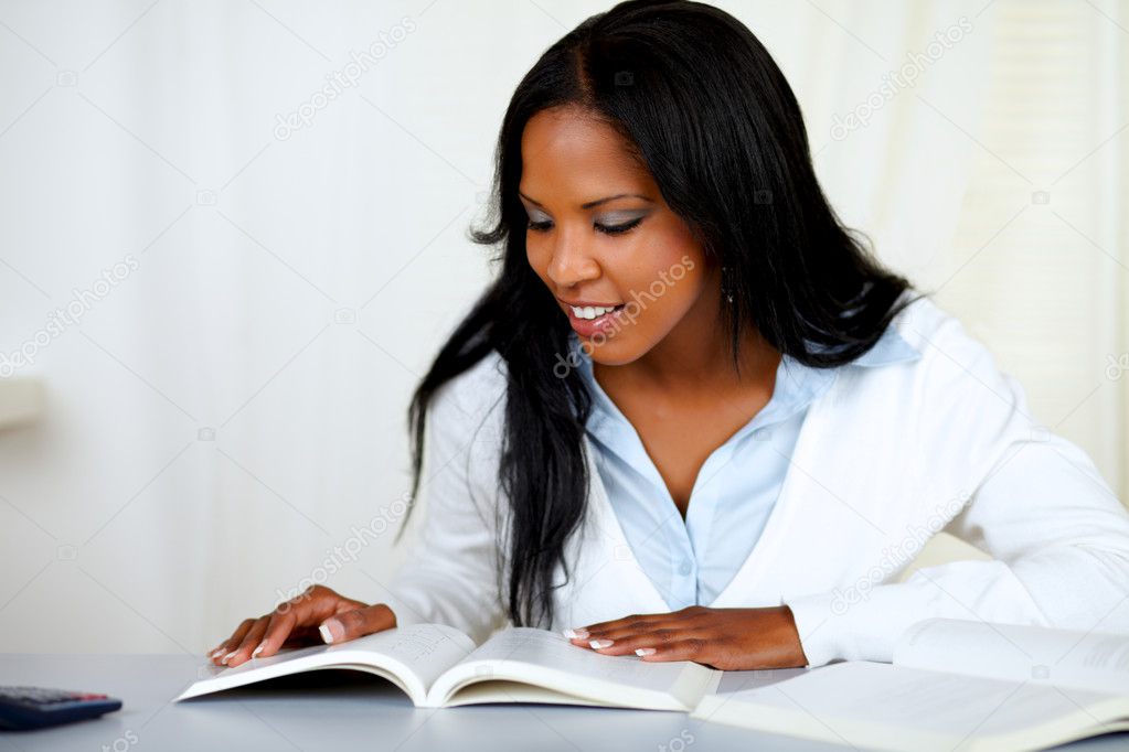 Beautiful black girl studying