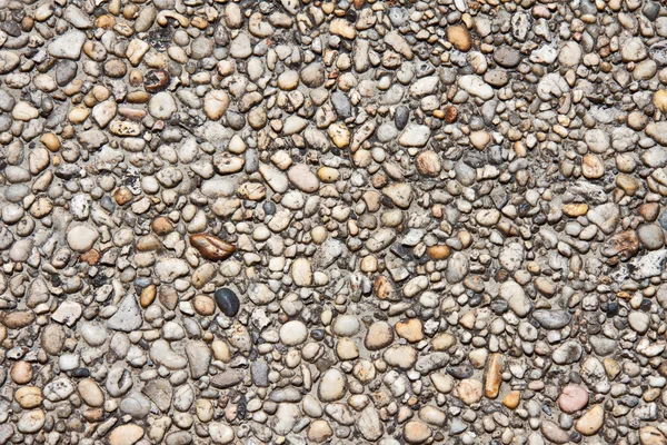 Pequeno padrão de mosaico de pedra — Fotografia de Stock