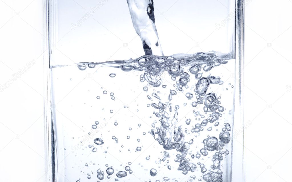 Water pouring into the glass