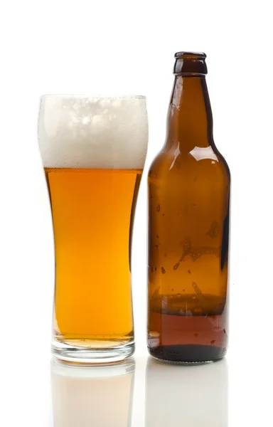 Склянка і пляшка пива Стокове Зображення