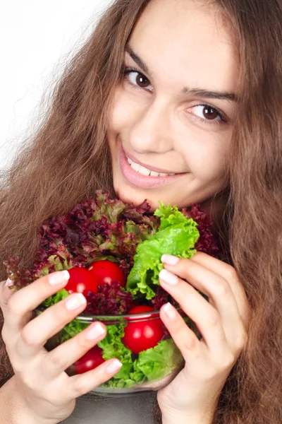 Young woman holding bowl of salad — Stock Photo, Image