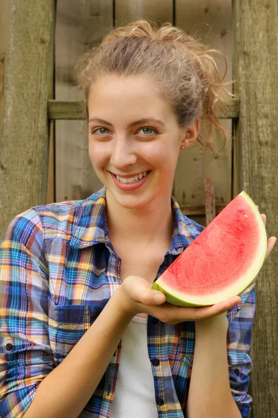 Teen and a watermelon — Stock Photo, Image