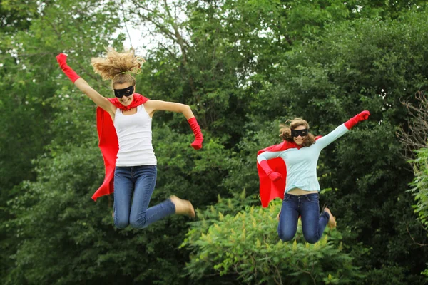 stock image Super heros team jumping