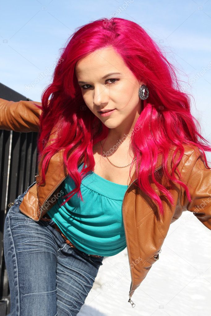 Confident girl with pink hair