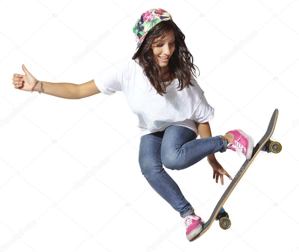 Skateboarder woman jumping isolated on white showing thumbs up